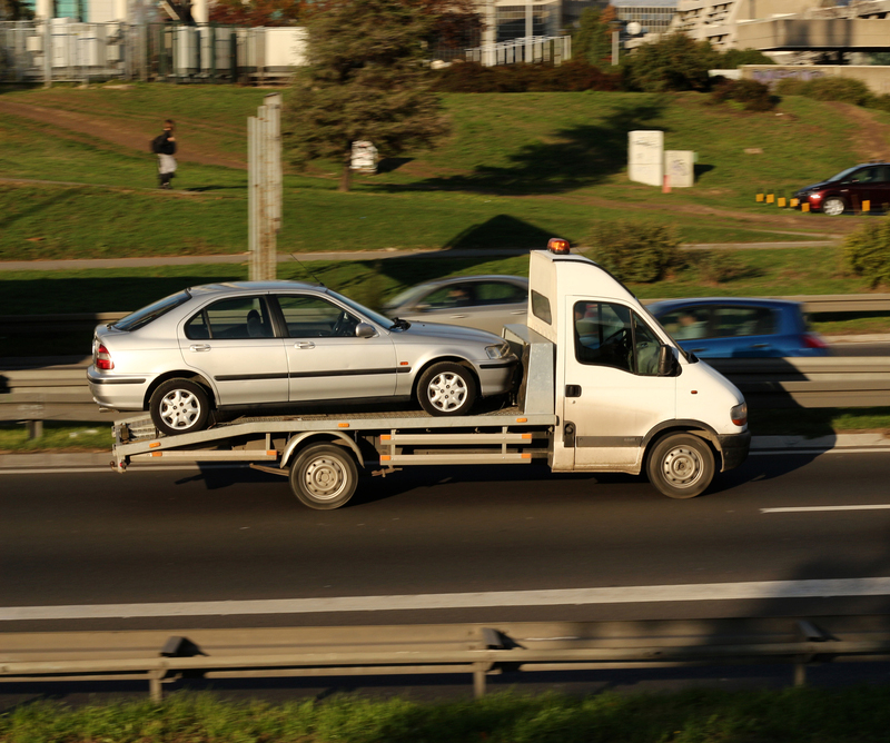 Tow truck assisting with vehicle breakdown in Aldershot